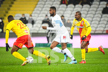 2022-01-22 - Gerson of Marseille and Gael KAKUTA of Lens during the French championship Ligue 1 football match between RC Lens and Olympique de Marseille on January 22, 2022 at Bollaert-Delelis stadium in Lens, France - RC LENS VS OLYMPIQUE DE MARSEILLE - FRENCH LIGUE 1 - SOCCER