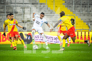 2022-01-22 - Facundo Axel MEDINA of Lens and Dimitri PAYET of Marseille during the French championship Ligue 1 football match between RC Lens and Olympique de Marseille on January 22, 2022 at Bollaert-Delelis stadium in Lens, France - RC LENS VS OLYMPIQUE DE MARSEILLE - FRENCH LIGUE 1 - SOCCER