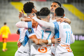2022-01-22 - Dimitri PAYET of Marseille celebrate his goal with teammates during the French championship Ligue 1 football match between RC Lens and Olympique de Marseille on January 22, 2022 at Bollaert-Delelis stadium in Lens, France - RC LENS VS OLYMPIQUE DE MARSEILLE - FRENCH LIGUE 1 - SOCCER