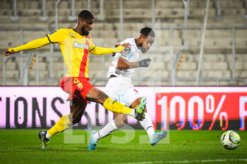 2022-01-22 - Kevin DANSO of Lens and Cedric BAKAMBU of Marseille during the French championship Ligue 1 football match between RC Lens and Olympique de Marseille on January 22, 2022 at Bollaert-Delelis stadium in Lens, France - RC LENS VS OLYMPIQUE DE MARSEILLE - FRENCH LIGUE 1 - SOCCER