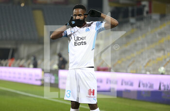 2022-01-22 - Cedric Bakambu of Marseille celebrates his goal during the French championship Ligue 1 football match between RC Lens (RCL) and Olympique de Marseille (OM) on January 22, 2022 at Stade Bollaert-Delelis in Lens, France - RC LENS VS OLYMPIQUE DE MARSEILLE - FRENCH LIGUE 1 - SOCCER