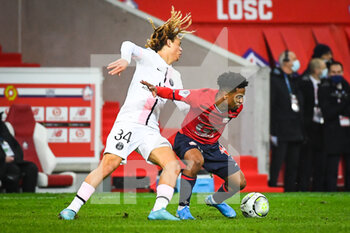 2022-02-06 - Xavi SIMONS of PSG and Angel GOMES of Lille during the French championship Ligue 1 football match between LOSC Lille and Paris Saint-Germain on February 6, 2022 at Pierre Mauroy stadium in Villeneuve-d'Ascq near Lille, France - LOSC LILLE VS PARIS SAINT-GERMAIN - FRENCH LIGUE 1 - SOCCER
