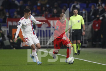 12/02/2022 - Melvin BARD of Nice and Romain FAIVRE of Lyon during the French championship Ligue 1 football match between Olympique Lyonnais and OGC Nice on February 12, 2022 at Groupama stadium in Decines-Charpieu near Lyon, France - OLYMPIQUE LYONNAIS VS OGC NICE - FRENCH LIGUE 1 - CALCIO