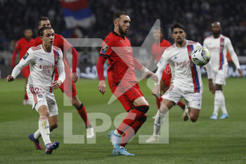 12/02/2022 - Amine GOUIRI of Nice and Maxence CAQUERET of Lyon during the French championship Ligue 1 football match between Olympique Lyonnais and OGC Nice on February 12, 2022 at Groupama stadium in Decines-Charpieu near Lyon, France - OLYMPIQUE LYONNAIS VS OGC NICE - FRENCH LIGUE 1 - CALCIO