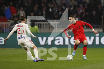12/02/2022 - Amine GOUIRI of Nice and Maxence CAQUERET of Lyon during the French championship Ligue 1 football match between Olympique Lyonnais and OGC Nice on February 12, 2022 at Groupama stadium in Decines-Charpieu near Lyon, France - OLYMPIQUE LYONNAIS VS OGC NICE - FRENCH LIGUE 1 - CALCIO