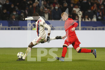 12/02/2022 - Tanguy NDOMBELE of Lyon and Melvin BARD of Nice during the French championship Ligue 1 football match between Olympique Lyonnais and OGC Nice on February 12, 2022 at Groupama stadium in Decines-Charpieu near Lyon, France - OLYMPIQUE LYONNAIS VS OGC NICE - FRENCH LIGUE 1 - CALCIO