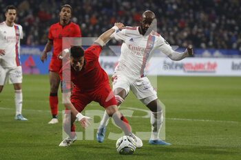 12/02/2022 - Flavius DANILIUC of Nice and Moussa DEMBELE of Lyon during the French championship Ligue 1 football match between Olympique Lyonnais and OGC Nice on February 12, 2022 at Groupama stadium in Decines-Charpieu near Lyon, France - OLYMPIQUE LYONNAIS VS OGC NICE - FRENCH LIGUE 1 - CALCIO