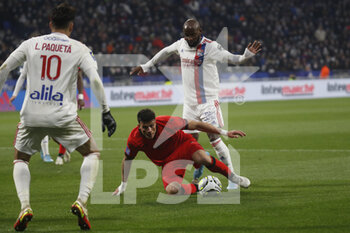 12/02/2022 - Flavius DANILIUC of Nice and Moussa DEMBELE of Lyon and Lucas PAQUETA of Lyon during the French championship Ligue 1 football match between Olympique Lyonnais and OGC Nice on February 12, 2022 at Groupama stadium in Decines-Charpieu near Lyon, France - OLYMPIQUE LYONNAIS VS OGC NICE - FRENCH LIGUE 1 - CALCIO