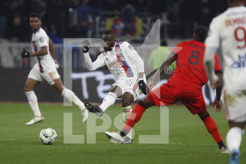 12/02/2022 - Tanguy NDOMBELE of Lyon and Cristian PAULINO ROSARIO of Nice during the French championship Ligue 1 football match between Olympique Lyonnais and OGC Nice on February 12, 2022 at Groupama stadium in Decines-Charpieu near Lyon, France - OLYMPIQUE LYONNAIS VS OGC NICE - FRENCH LIGUE 1 - CALCIO