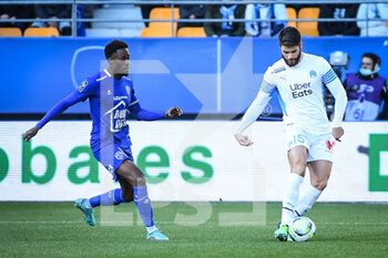 2022-02-27 - Gabriel MUTOMBO of ESTAC Troyes and Duje CALETA-CAR of Marseille during the French championship Ligue 1 football match between ESTAC Troyes and Olympique de Marseille on February 27, 2022 at Stade de l'Aube in Troyes, France - ESTAC TROYES VS OLYMPIQUE DE MARSEILLE - FRENCH LIGUE 1 - SOCCER