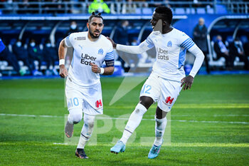 2022-02-27 - Dimitri PAYET of Marseille celebrate his goal with Bamba DIENG of Marseille during the French championship Ligue 1 football match between ESTAC Troyes and Olympique de Marseille on February 27, 2022 at Stade de l'Aube in Troyes, France - ESTAC TROYES VS OLYMPIQUE DE MARSEILLE - FRENCH LIGUE 1 - SOCCER