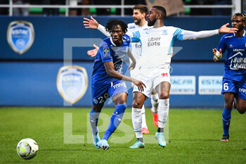 2022-02-27 - Issa KABORE of Troyes and Gerson of Marseille during the French championship Ligue 1 football match between ESTAC Troyes and Olympique de Marseille on February 27, 2022 at Stade de l'Aube in Troyes, France - ESTAC TROYES VS OLYMPIQUE DE MARSEILLE - FRENCH LIGUE 1 - SOCCER