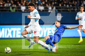 2022-02-27 - Luis HENRIQUE of Marseille and Yoann TOUZGHAR of ESTAC Troyes during the French championship Ligue 1 football match between ESTAC Troyes and Olympique de Marseille on February 27, 2022 at Stade de l'Aube in Troyes, France - ESTAC TROYES VS OLYMPIQUE DE MARSEILLE - FRENCH LIGUE 1 - SOCCER