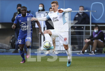 2022-02-27 - Valentin Rongier of Marseille, Abdu Cadri Conte of Troyes (left) during the French championship Ligue 1 football match between ESTAC Troyes and Olympique de Marseille (OM) on February 27, 2022 at Stade de l'Aube in Troyes, France - ESTAC TROYES VS OLYMPIQUE DE MARSEILLE - FRENCH LIGUE 1 - SOCCER