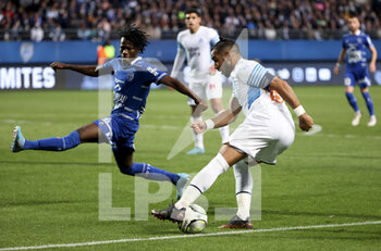 28/02/2022 - Dimitri Payet of Marseille, Issa Kabore of Troyes (left) during the French championship Ligue 1 football match between ESTAC Troyes and Olympique de Marseille (OM) on February 27, 2022 at Stade de l'Aube in Troyes, France - ESTAC TROYES VS OLYMPIQUE DE MARSEILLE (OM) - FRENCH LIGUE 1 - CALCIO