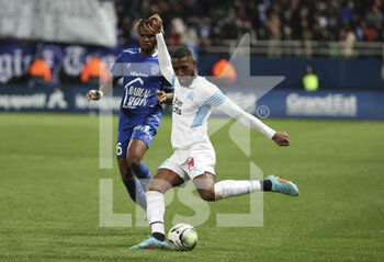 28/02/2022 - Gerson Santos da Silva of Marseille, Rominigue Kouame of Troyes (left) during the French championship Ligue 1 football match between ESTAC Troyes and Olympique de Marseille (OM) on February 27, 2022 at Stade de l'Aube in Troyes, France - ESTAC TROYES VS OLYMPIQUE DE MARSEILLE (OM) - FRENCH LIGUE 1 - CALCIO
