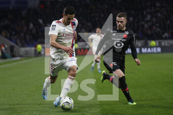 27/02/2022 - Romain FAIVRE of Lyon and Gabriel GUDMUNDSSON of Lille during the French championship Ligue 1 football match between Olympique Lyonnais (Lyon) and LOSC Lille on February 27, 2022 at Groupama stadium in Decines-Charpieu near Lyon, France - OLYMPIQUE LYONNAIS (LYON) VS LOSC LILLE - FRENCH LIGUE 1 - CALCIO