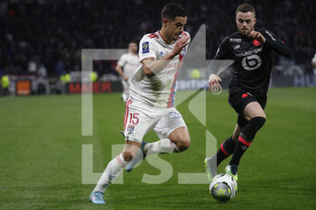 27/02/2022 - Romain FAIVRE of Lyon and Gabriel GUDMUNDSSON of Lille during the French championship Ligue 1 football match between Olympique Lyonnais (Lyon) and LOSC Lille on February 27, 2022 at Groupama stadium in Decines-Charpieu near Lyon, France - OLYMPIQUE LYONNAIS (LYON) VS LOSC LILLE - FRENCH LIGUE 1 - CALCIO