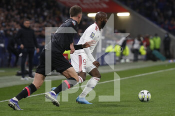 27/02/2022 - Moussa DEMBELE of Lyon and Sven BOTMAN of Lille during the French championship Ligue 1 football match between Olympique Lyonnais (Lyon) and LOSC Lille on February 27, 2022 at Groupama stadium in Decines-Charpieu near Lyon, France - OLYMPIQUE LYONNAIS (LYON) VS LOSC LILLE - FRENCH LIGUE 1 - CALCIO
