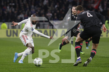 27/02/2022 - Moussa DEMBELE of Lyon and Sven BOTMAN of Lille during the French championship Ligue 1 football match between Olympique Lyonnais (Lyon) and LOSC Lille on February 27, 2022 at Groupama stadium in Decines-Charpieu near Lyon, France - OLYMPIQUE LYONNAIS (LYON) VS LOSC LILLE - FRENCH LIGUE 1 - CALCIO