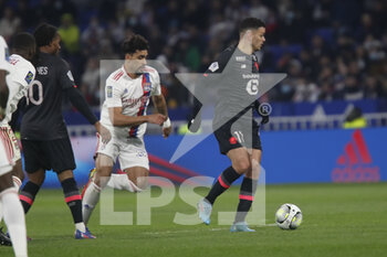 27/02/2022 - Hatem BEN ARFA of Lille and Lucas PAQUETA of Lyon during the French championship Ligue 1 football match between Olympique Lyonnais (Lyon) and LOSC Lille on February 27, 2022 at Groupama stadium in Decines-Charpieu near Lyon, France - OLYMPIQUE LYONNAIS (LYON) VS LOSC LILLE - FRENCH LIGUE 1 - CALCIO