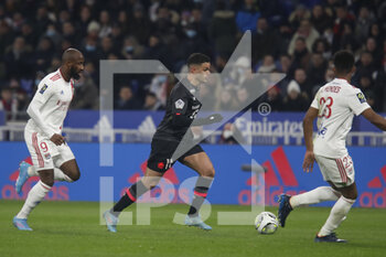 27/02/2022 - Hatem BEN ARFA of Lille and Moussa DEMBELE of Lyon and Thiago MENDES of Lyon during the French championship Ligue 1 football match between Olympique Lyonnais (Lyon) and LOSC Lille on February 27, 2022 at Groupama stadium in Decines-Charpieu near Lyon, France - OLYMPIQUE LYONNAIS (LYON) VS LOSC LILLE - FRENCH LIGUE 1 - CALCIO