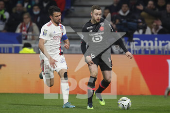 27/02/2022 - Gabriel GUDMUNDSSON of Lille and Leo DUBOIS of Lyon during the French championship Ligue 1 football match between Olympique Lyonnais (Lyon) and LOSC Lille on February 27, 2022 at Groupama stadium in Decines-Charpieu near Lyon, France - OLYMPIQUE LYONNAIS (LYON) VS LOSC LILLE - FRENCH LIGUE 1 - CALCIO