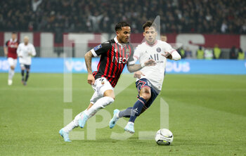 2022-03-05 - Justin Kluivert of Nice, Juan Bernat of PSG during the French championship Ligue 1 football match between OGC Nice (OGCN) and Paris Saint-Germain (PSG) on March 5, 2022 at Allianz Riviera stadium in Nice, France - OGC NICE (OGCN) VS PARIS SAINT-GERMAIN (PSG) - FRENCH LIGUE 1 - SOCCER