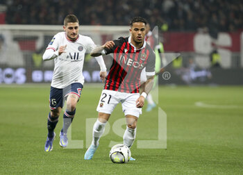 2022-03-05 - Justin Kluivert of Nice, Marco Verratti of PSG (left) during the French championship Ligue 1 football match between OGC Nice (OGCN) and Paris Saint-Germain (PSG) on March 5, 2022 at Allianz Riviera stadium in Nice, France - OGC NICE (OGCN) VS PARIS SAINT-GERMAIN (PSG) - FRENCH LIGUE 1 - SOCCER