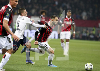 2022-03-05 - Amine Gouiri of Nice, Marco Verratti of PSG (left) during the French championship Ligue 1 football match between OGC Nice (OGCN) and Paris Saint-Germain (PSG) on March 5, 2022 at Allianz Riviera stadium in Nice, France - OGC NICE (OGCN) VS PARIS SAINT-GERMAIN (PSG) - FRENCH LIGUE 1 - SOCCER