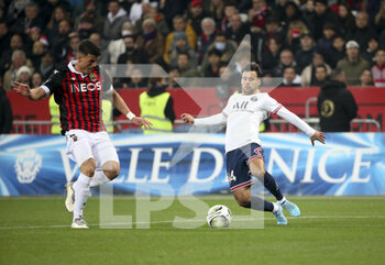 2022-03-05 - Juan Bernat of PSG, Flavius Daniliuc of Nice (left) during the French championship Ligue 1 football match between OGC Nice (OGCN) and Paris Saint-Germain (PSG) on March 5, 2022 at Allianz Riviera stadium in Nice, France - OGC NICE (OGCN) VS PARIS SAINT-GERMAIN (PSG) - FRENCH LIGUE 1 - SOCCER