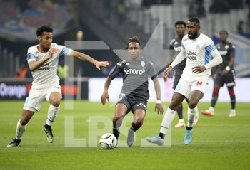 2022-03-06 - Gelson Martins of Monaco between Boubacar Kamara and Gerson Santos da Silva of Marseille during the French championship Ligue 1 football match between Olympique de Marseille (OM) and AS Monaco (ASM) on March 6, 2022 at Velodrome stadium in Marseille, France - OLYMPIQUE DE MARSEILLE (OM) VS AS MONACO (ASM) - FRENCH LIGUE 1 - SOCCER
