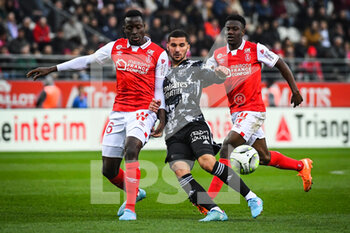 2022-03-20 - Dion LOPY of Reims and Houssem AOUAR of Lyon during the French championship Ligue 1 football match between Stade de Reims and Olympique Lyonnais on March 20, 2022 at Auguste Delaune stadium in Reims, France - STADE DE REIMS VS OLYMPIQUE LYONNAIS - FRENCH LIGUE 1 - SOCCER