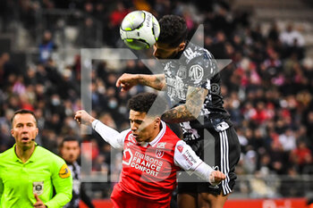 2022-03-20 - Ilan KEBBAL of Reims and HENRIQUE of Lyon during the French championship Ligue 1 football match between Stade de Reims and Olympique Lyonnais on March 20, 2022 at Auguste Delaune stadium in Reims, France - STADE DE REIMS VS OLYMPIQUE LYONNAIS - FRENCH LIGUE 1 - SOCCER