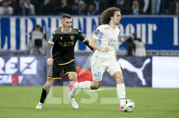 20/03/2022 - Matteo Guendouzi of Marseille, Morgan Schneiderlin of Nice (left) during the French championship Ligue 1 football match between Olympique de Marseille and OGC Nice on March 20, 2022 at Velodrome stadium in Marseille, France - OLYMPIQUE DE MARSEILLE VS OGC NICE - FRENCH LIGUE 1 - CALCIO