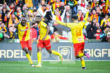 10/04/2022 - Cheick DOUCOURE of Lens celebrate his goal with teammates during the French championship Ligue 1 football match between RC Lens and OGC Nice on April 10, 2022 at Bollaert-Delelis stadium in Lens, France - RC LENS VS OGC NICE - FRENCH LIGUE 1 - CALCIO
