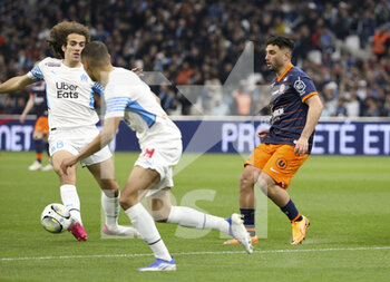 10/04/2022 - Jordan Ferri of Montpellier, Matteo Guendouzi of Marseille (left) during the French championship Ligue 1 football match between Olympique de Marseille (OM) and Montpellier HSC (MHSC) on April 10, 2022 at Stade Velodrome in Marseille, France - OLYMPIQUE DE MARSEILLE (OM) VS MONTPELLIER HSC (MHSC) - FRENCH LIGUE 1 - CALCIO