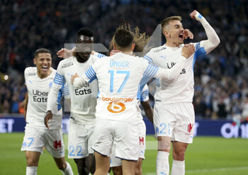 10/04/2022 - Cengiz Under of Marseille #17 celebrates his goal on a penalty kick with Amine Harit, Pape Gueye, Valentin Rongier during the French championship Ligue 1 football match between Olympique de Marseille (OM) and Montpellier HSC (MHSC) on April 10, 2022 at Stade Velodrome in Marseille, France - OLYMPIQUE DE MARSEILLE (OM) VS MONTPELLIER HSC (MHSC) - FRENCH LIGUE 1 - CALCIO