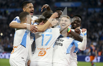 10/04/2022 - Cengiz Under of Marseille #17 celebrates his goal on a penalty kick with William Saliba, Valentin Rongier, Bamba Dieng during the French championship Ligue 1 football match between Olympique de Marseille (OM) and Montpellier HSC (MHSC) on April 10, 2022 at Stade Velodrome in Marseille, France - OLYMPIQUE DE MARSEILLE (OM) VS MONTPELLIER HSC (MHSC) - FRENCH LIGUE 1 - CALCIO