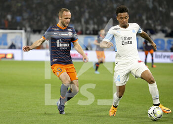 10/04/2022 - Boubacar Kamara of Marseille, Valere Germain of Montpellier (left) during the French championship Ligue 1 football match between Olympique de Marseille (OM) and Montpellier HSC (MHSC) on April 10, 2022 at Stade Velodrome in Marseille, France - OLYMPIQUE DE MARSEILLE (OM) VS MONTPELLIER HSC (MHSC) - FRENCH LIGUE 1 - CALCIO
