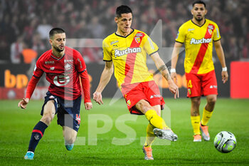 2022-04-16 - Edon ZHEGROVA of Lille and Florian SOTOCA of Lens during the French championship Ligue 1 football match between LOSC Lille and RC Lens on April 16, 2022 at Pierre Mauroy stadium in Villeneuve-d'Ascq near Lille, France - LOSC LILLE VS RC LENS - FRENCH LIGUE 1 - SOCCER