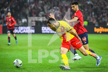 16/04/2022 - Florian SOTOCA of Lens and Zeki CELIK of Lille during the French championship Ligue 1 football match between LOSC Lille and RC Lens on April 16, 2022 at Pierre Mauroy stadium in Villeneuve-d'Ascq near Lille, France - LOSC LILLE VS RC LENS - FRENCH LIGUE 1 - CALCIO