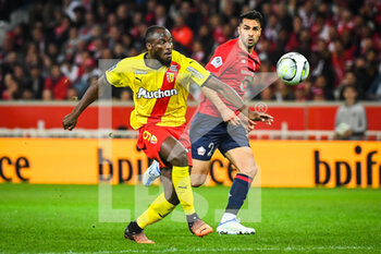 16/04/2022 - Ignatius GANAGO of Lens and Zeki CELIK of Lille during the French championship Ligue 1 football match between LOSC Lille and RC Lens on April 16, 2022 at Pierre Mauroy stadium in Villeneuve-d'Ascq near Lille, France - LOSC LILLE VS RC LENS - FRENCH LIGUE 1 - CALCIO