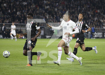 2022-04-20 - Ismael Traore of Angers, Kylian Mbappe of PSG during the French championship Ligue 1 football match between SCO Angers and Paris Saint-Germain on April 20, 2022 at Raymond Kopa stadium in Angers, France - SCO ANGERS VS PARIS SAINT-GERMAIN - FRENCH LIGUE 1 - SOCCER