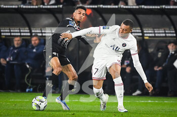 2022-04-20 - Azzedine OUNAHI of Angers and Kylian MBAPPE of PSG during the French championship Ligue 1 football match between SCO Angers and Paris Saint-Germain on April 20, 2022 at Raymond Kopa stadium in Angers, France - SCO ANGERS VS PARIS SAINT-GERMAIN - FRENCH LIGUE 1 - SOCCER