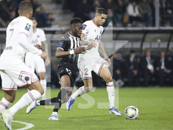 2022-04-20 - Abdoulaye Bamba of Angers, Achraf Hakimi of PSG during the French championship Ligue 1 football match between SCO Angers and Paris Saint-Germain on April 20, 2022 at Raymond Kopa stadium in Angers, France - SCO ANGERS VS PARIS SAINT-GERMAIN - FRENCH LIGUE 1 - SOCCER