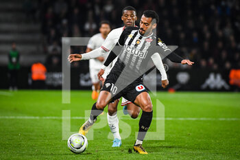 2022-04-20 - Georginio WIJNALDUM of PSG and Angelo FULGINI of Angers during the French championship Ligue 1 football match between SCO Angers and Paris Saint-Germain on April 20, 2022 at Raymond Kopa stadium in Angers, France - SCO ANGERS VS PARIS SAINT-GERMAIN - FRENCH LIGUE 1 - SOCCER