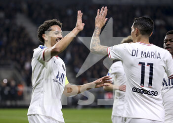 2022-04-20 - Marquinhos of PSG celebrates his goal with Angel Di Maria during the French championship Ligue 1 football match between SCO Angers and Paris Saint-Germain on April 20, 2022 at Raymond Kopa stadium in Angers, France - SCO ANGERS VS PARIS SAINT-GERMAIN - FRENCH LIGUE 1 - SOCCER