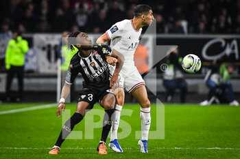 2022-04-20 - Souleyman DOUMBIA of Angers and Achraf HAKIMI of PSG during the French championship Ligue 1 football match between SCO Angers and Paris Saint-Germain on April 20, 2022 at Raymond Kopa stadium in Angers, France - SCO ANGERS VS PARIS SAINT-GERMAIN - FRENCH LIGUE 1 - SOCCER