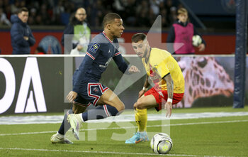 23/04/2022 - Kylian Mbappe of PSG, Jonathan Clauss of Lens during the French championship Ligue 1 football match between Paris Saint-Germain (PSG) and RC Lens (RCL) on April 23, 2022 at Parc des Princes stadium in Paris, France - PARIS SAINT-GERMAIN VS RC LENS - FRENCH LIGUE 1 - CALCIO